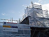 scaffolding and signs